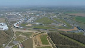 Fast Cars on Silverstone Track Aerial England Summer - Powered by Shutterstock - Get 15% off with code: PIKWIZARD15