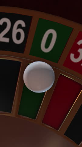 Ball spins at zero on the roulette wheel and stops.