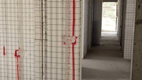 Polystyrene panels combined with wire mesh. Modern house under construction with polystyrene insulation. Insulation materials. Materials for wall insulation. Welded wire reinforcement - Powered by Shutterstock - Get 15% off with code: PIKWIZARD15