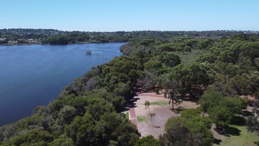 Aerial flyover lakeside cyclepath - Joondalup Lake Perth Australia