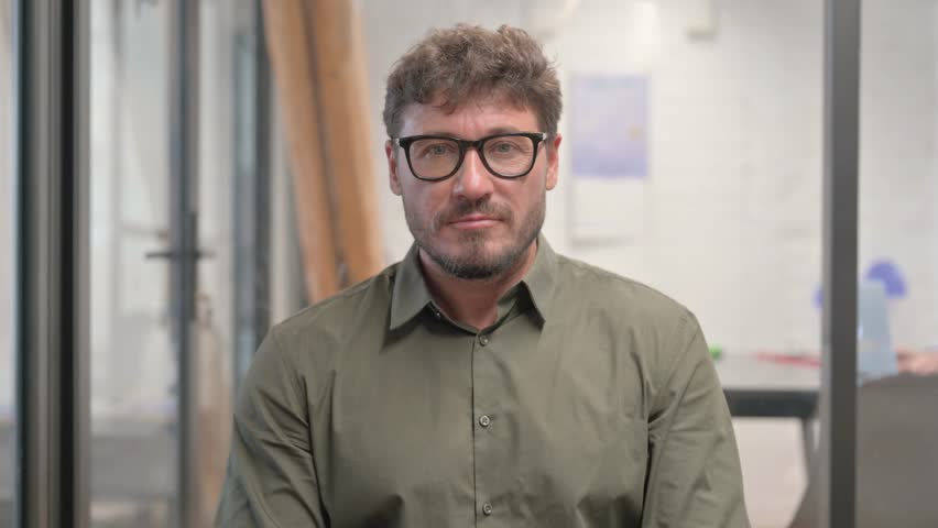 Portrait of Brainstorming Middle Aged Man