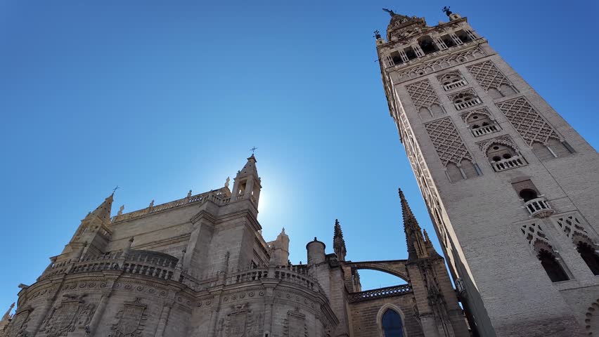 Seville Cathedral And Giralda Tower In Andalusia, Spain.