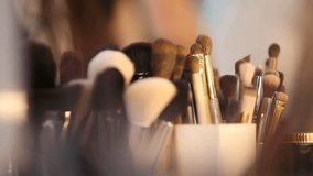 This  video displays a variety of makeup brushes, highlighting their soft bristles and different colors. Ideal for beauty, cosmetics, and makeup product promotions. - Powered by Shutterstock - Get 15% off with code: PIKWIZARD15