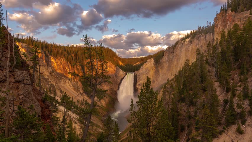Timelapse, Clouds Moving Above Lower Falls in Yellowstone National Park, Wyoming USA
