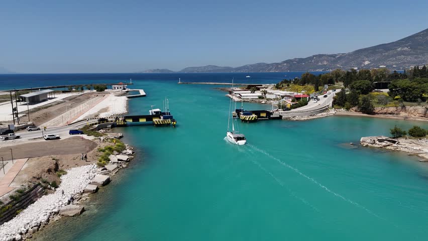 Aerial video of a ship leaving the Corinth Canal, Greece