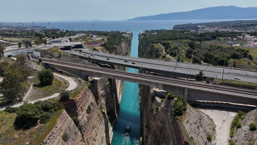 View of a red boat in the Corinth canal, Greece