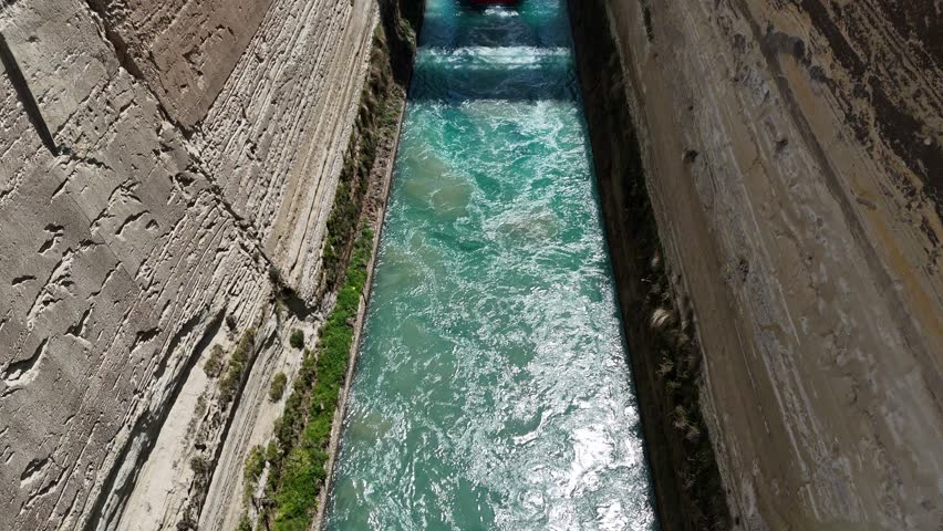 View of a red boat in the Corinth canal, Greece