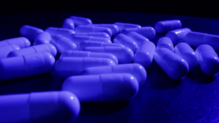 Pills and vitamins macro, Close up view of womans hands holding plenty of different drugs. Painkillers and antibiotics. Healthcare and medicine concept