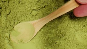Matcha green tea cooking process, japanese powder green tea in a bowl with bamboo whisk, macro close up in cafe of powder green tea.  - Powered by Shutterstock - Get 15% off with code: PIKWIZARD15