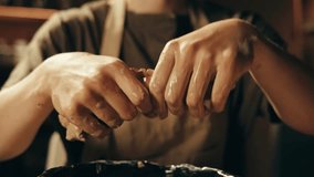 Woman potter works with clay on master class in studio. Working process in ceramic workshop. Potter making vase on pottery wheel. Handmade concept.  - Powered by Shutterstock - Get 15% off with code: PIKWIZARD15