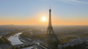 Aerial view of Experience the breathtaking beauty of a stunning Paris sunrise with the iconic Eiffel Tower. France - Powered by Shutterstock - Get 15% off with code: PIKWIZARD15