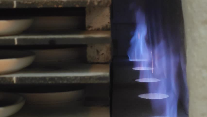 Ceramic kiln flame on background