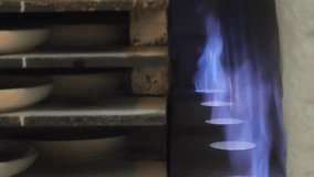 Ceramic kiln flame on background - Powered by Shutterstock - Get 15% off with code: PIKWIZARD15