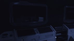 Inside a spaceship cockpit, dim lighting creates a mysterious atmosphere. Various technical instruments and screens are visible, indicating active controls and monitoring equipment. - Powered by Shutterstock - Get 15% off with code: PIKWIZARD15