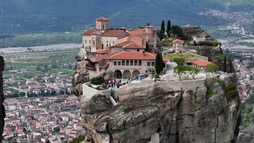Flight over Meteora, a beautiful rock formation in Trikala, Thessaly. Ancient monasteries are built on the peaks of the steep rocks. Greece