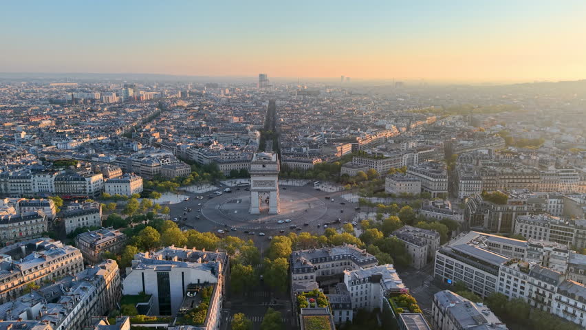 Aerial view of Mesmerizing Aerial View of Paris Featuring the Arc de Triomphe at Beautiful Sunrise Hours. France