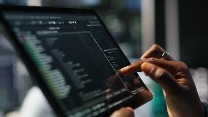 Close up of server room programmer checking coding on tablet enhancing operational efficiency and reducing downtime. Developer verifying programming language script used to update gear, camera B - Powered by Shutterstock - Get 15% off with code: PIKWIZARD15