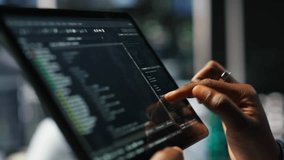 Close up of server room programmer checking coding on tablet enhancing operational efficiency and reducing downtime. Developer verifying programming language script used to update gear, camera B - Powered by Shutterstock - Get 15% off with code: PIKWIZARD15