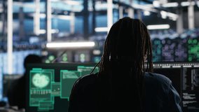 Server hub admin responds to cyberattack attempting to access confidential data while securing hardware systems. Data center worker fighting malware intrusion during security incident, camera B - Powered by Shutterstock - Get 15% off with code: PIKWIZARD15