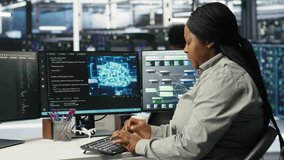 Data center technician using artificial intelligence deep learning models to configure hardware. African american woman works on AI programming language in server room, optimizing system, camera B - Powered by Shutterstock - Get 15% off with code: PIKWIZARD15