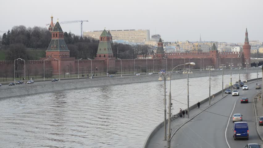 Kremlin wall, Moscow river embarkment and road traffic: still footage.