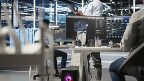 Data center technician using tablet to do node tree programming, optimizing resource allocation. Server room IT expert using predictive AI visualization systems for maintenance planning, camera A - Powered by Shutterstock - Get 15% off with code: PIKWIZARD15