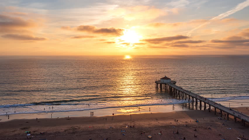 Pacific Ocean During Sunset At The Manhattan Beach Pier In Manhattan Beach, California, USA. Timelapse