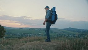 Joint Health, Physiotherapy, Resilient Aging. Senior Man Hikes Through Mountains While Managing Knee and Back Pain. A Real Moment of Strength, Movement Therapy, and Health Support in Later Life - Powered by Shutterstock - Get 15% off with code: PIKWIZARD15