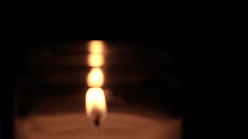 Candle Lit in Darkness with Soft Glow