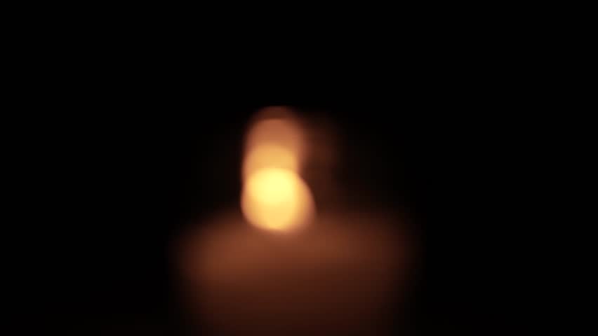Candle Lit in Darkness with Soft Glow