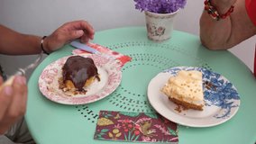 Elderly grandmother and young grandson building family connection, sharing sweet dessert moment at home kitchen table with warmth and genuine affection - Powered by Shutterstock - Get 15% off with code: PIKWIZARD15