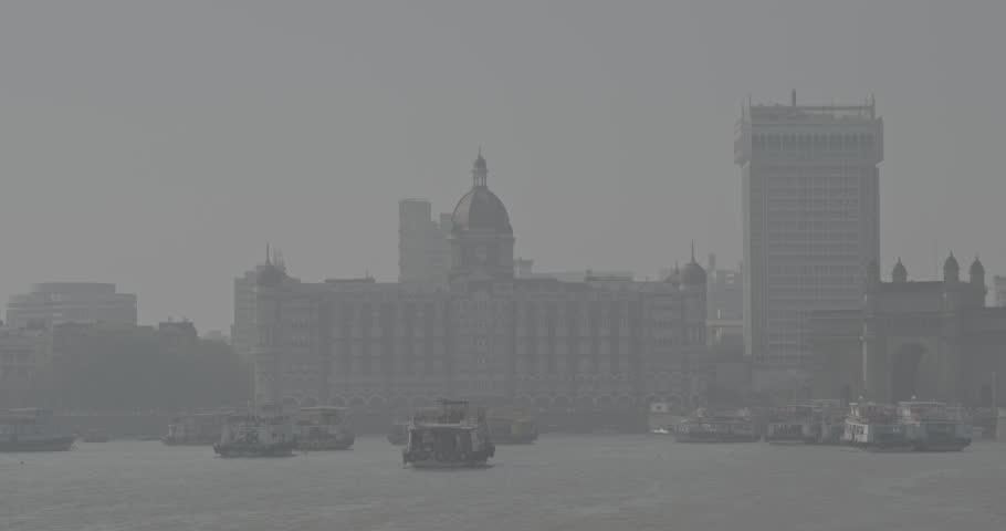 Mumbai, India. Many Boats with Tourists floating on the Arabian Sea. Tourists boats floating near Taj Mahal Palace hotel and Gateway of India. Cityscape skyline of Mumbai. Ungraded C LOG 2