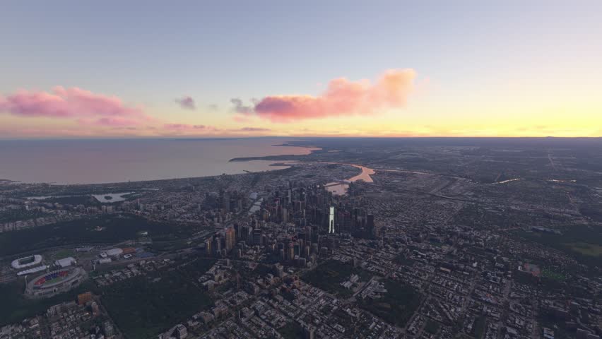3D - Side aerial drone view at sunset of Melbourne city in Victoria. Australia
