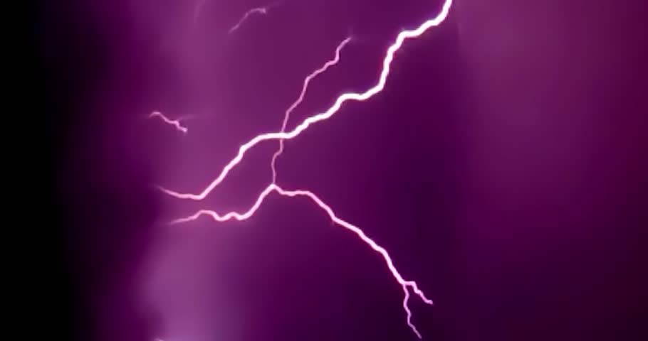 Lightning storm in the night sky. Multiple lightnings and thunders illuminate night sky