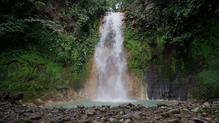 Still wide shot of Tepezquintle Waterfall at Blue Falls, Costa Rica