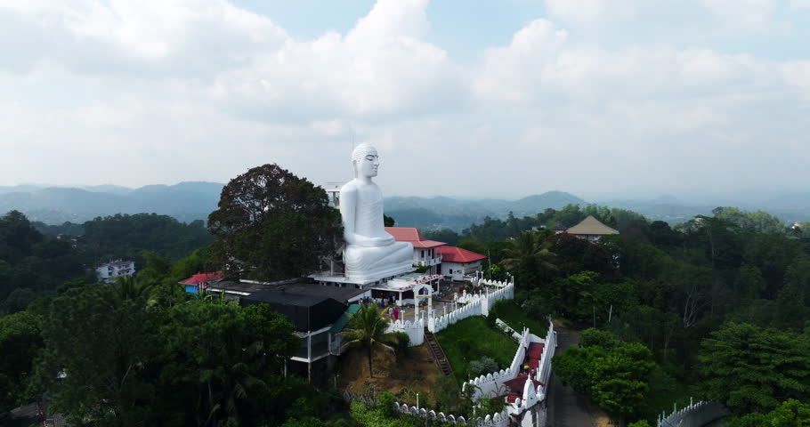 Buddha Statue Of Sri Maha Bodhi Viharaya In Kandy, Sri Lanka. - aerial shot