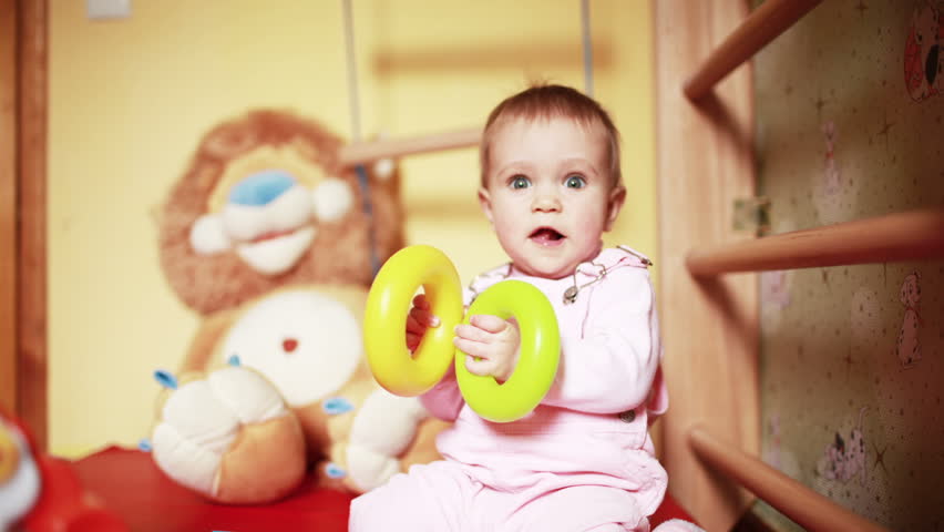 Baby play with toys, video from photo sequence