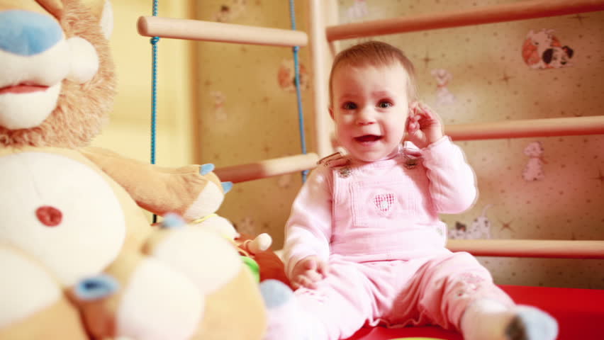 Baby play with toys, video from photo sequence