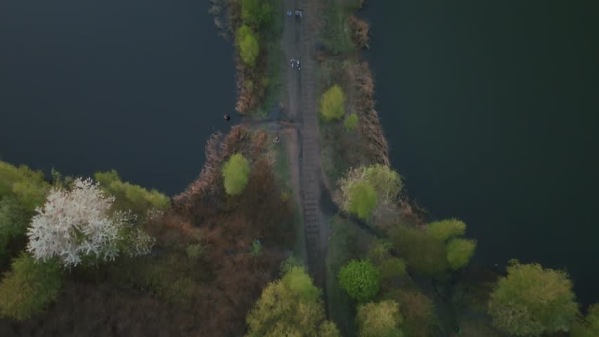 Downward view on path between lakes Downward view on path between lakes