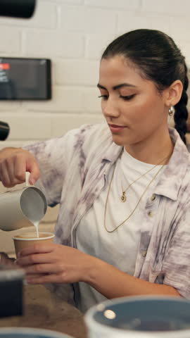 Happy, woman and barista with latte, coffee shop and purchase of hot beverage, takeaway and morning. Hospitality, customer and server with cup in small business, people and smile for sale in cafe