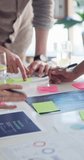 Hands, brainstorming and business people with documents, sticky note or feedback for tech development. Closeup, group or employees in workplace, planning or charts for user experience and cooperation - Powered by Shutterstock - Get 15% off with code: PIKWIZARD15