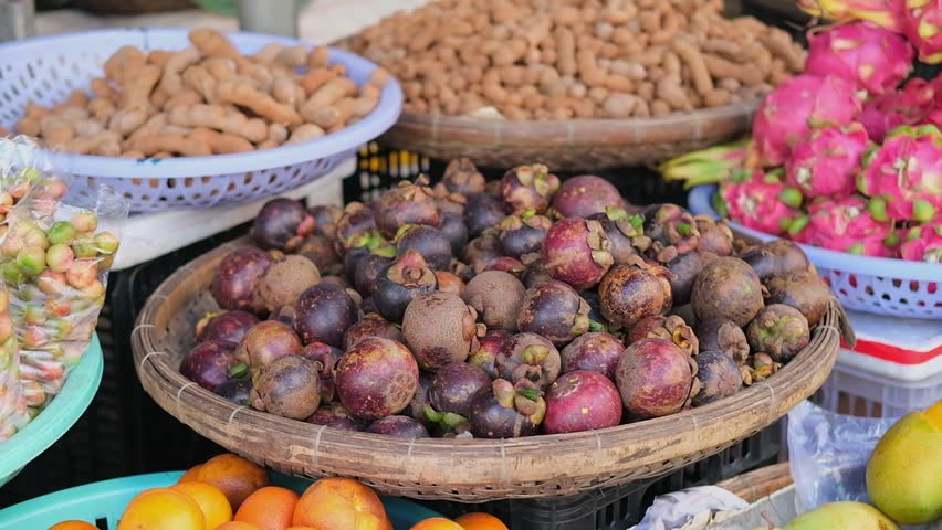 Local market with exotic fruits in Vietnam, Nha Trang resort