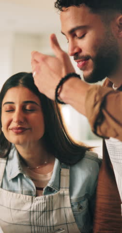 Couple, cooking and aroma with smell in kitchen, conversation and laugh for nutrition advice or dinner. Man, woman and teaching with ingredients, support and help with talking for meal prep in home