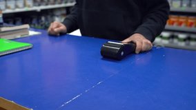 Customer making a contactless payment with a credit card, held near the POS terminal by the pharmacist - Powered by Shutterstock - Get 15% off with code: PIKWIZARD15