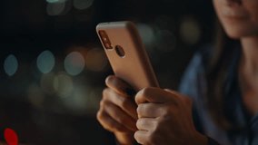 Lady hands texting mobile phone at dark home closeup. Woman freelancer typing message on cellphone at night apartment workplace. Young businesswoman writing notification on smartphone late evening. - Powered by Shutterstock - Get 15% off with code: PIKWIZARD15