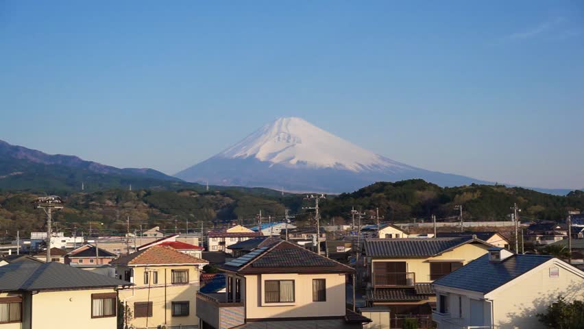 Fuji mountain on a sunny day in spring and SUSONO city landscape at SHIZUOKA, JAPAN - APRIL 2025