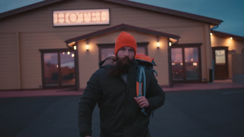 Man Walking to Car Early Morning in Iceland