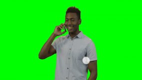 Man holding smartphone talking in tech studio, displaying floating network icons connected by lines. Technology, communication, connectivity, digital, innovation, networking, futurism - Powered by Shutterstock - Get 15% off with code: PIKWIZARD15