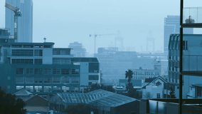 Financial line graphs moving across grid window in flat design overlooking city skyline with cranes. Urban, skyline, skyscraper, modern, financial, business, architecture - Powered by Shutterstock - Get 15% off with code: PIKWIZARD15