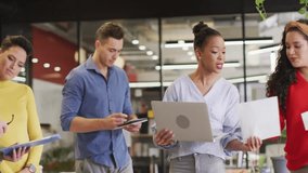 Team of professionals discussing social media strategy in modern office, with floating metric icons. Collaboration, teamwork, digital, innovation, modern, communication, analytics - Powered by Shutterstock - Get 15% off with code: PIKWIZARD15